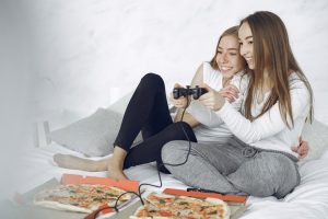 Happy Women playing Games Together